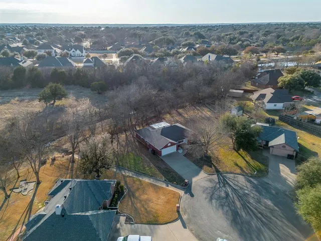 an aerial view of residential house with outdoor space