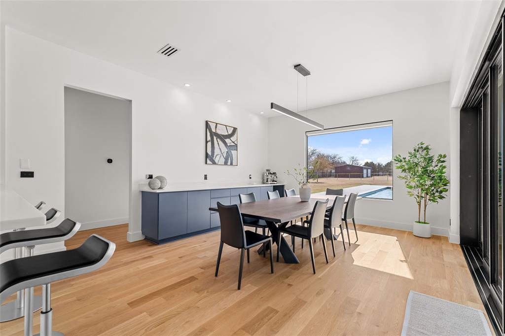 5020 Montgomery Road Midlothian, TX 76065 - Photo 15 of 40 Dining space featuring light wood finished floors and recessed lighting