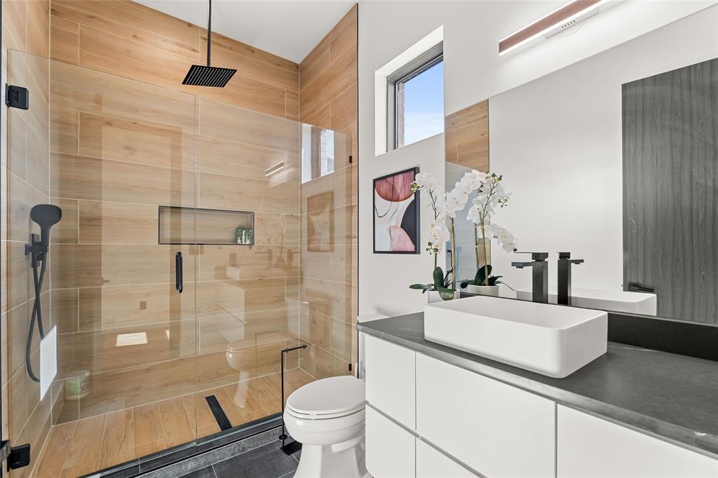 5020 Montgomery Road Midlothian, TX 76065 - Photo 28 of 40 Bathroom featuring a stall shower and vanity