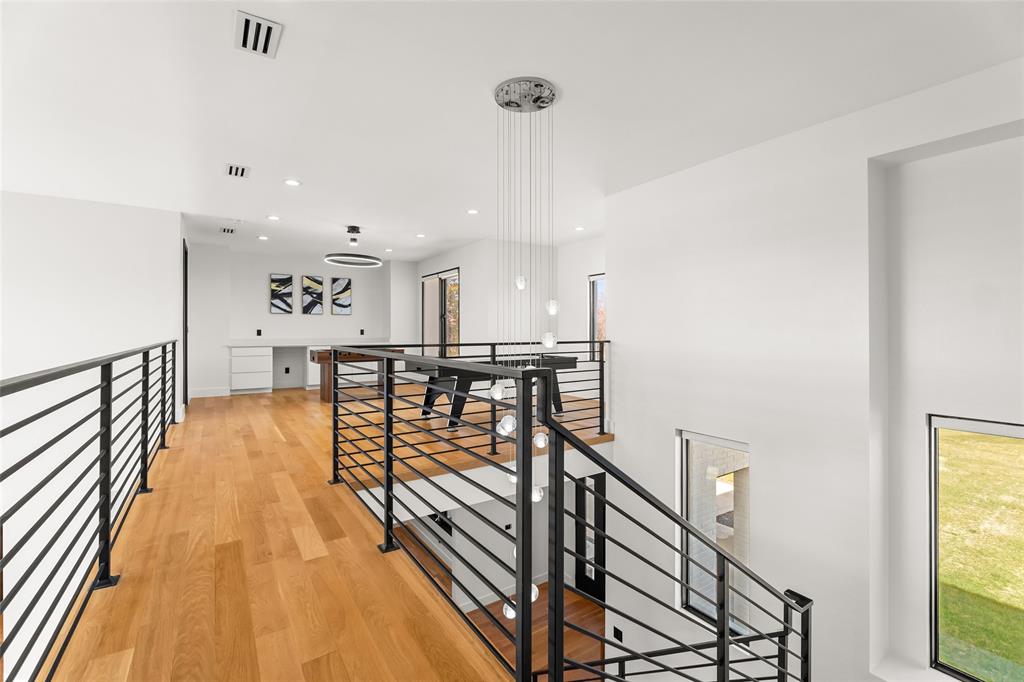 5020 Montgomery Road Midlothian, TX 76065 - Photo 30 of 40 Hall with an upstairs landing, light wood finished floors, and recessed lighting