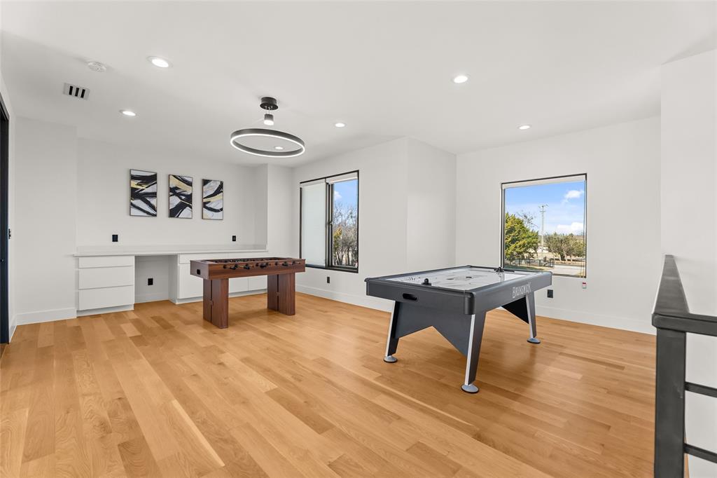5020 Montgomery Road Midlothian, TX 76065 - Photo 31 of 40 Playroom with recessed lighting, light wood finished floors, and built in desk