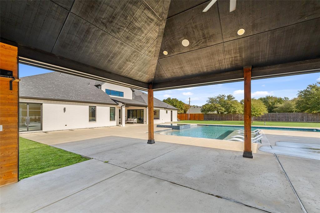 5020 Montgomery Road Midlothian, TX 76065 - Photo 34 of 40 Combined pool / hot tub with a patio and a fenced backyard
