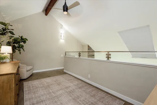a view of storage and utility room with a window