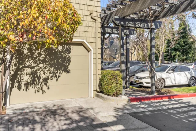 a view of a bench in front of a building