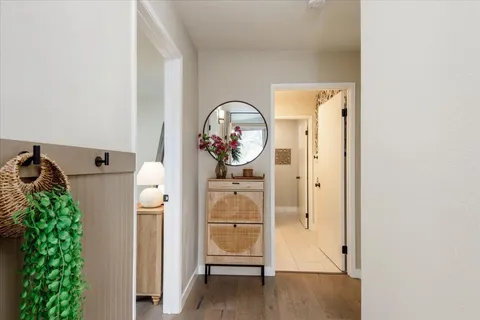 a view of a livingroom with wooden floor