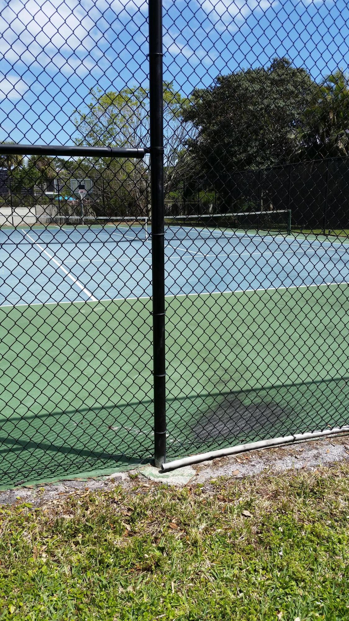 800 Northwest Fork Road, Unit 71 Stuart, FL 34994 - Photo 22 of 23 800 NW Fork Rd. tennis courts
