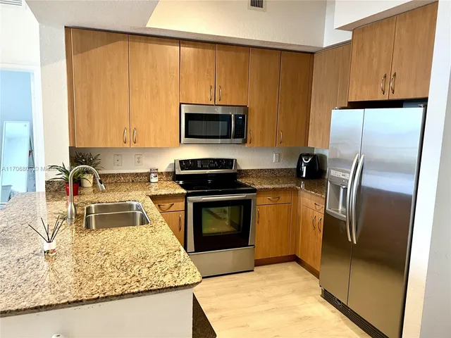 $359,000 | 1830 Radius Drive, Unit 1203, Hollywood, FL 33020