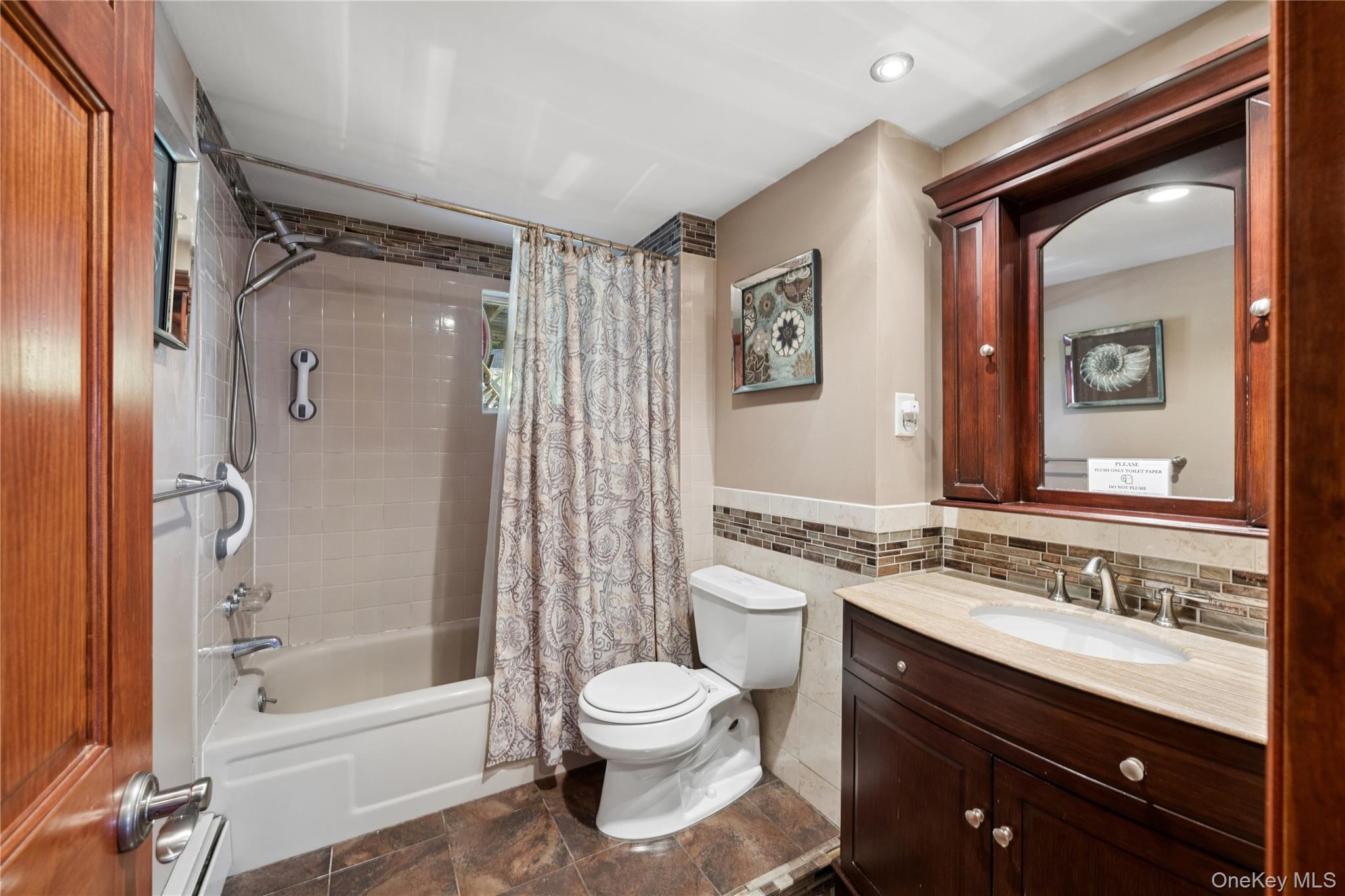 44 Archie Place West Islip, NY 11795 - Photo 17 of 36 a bathroom with a sink toilet and shower