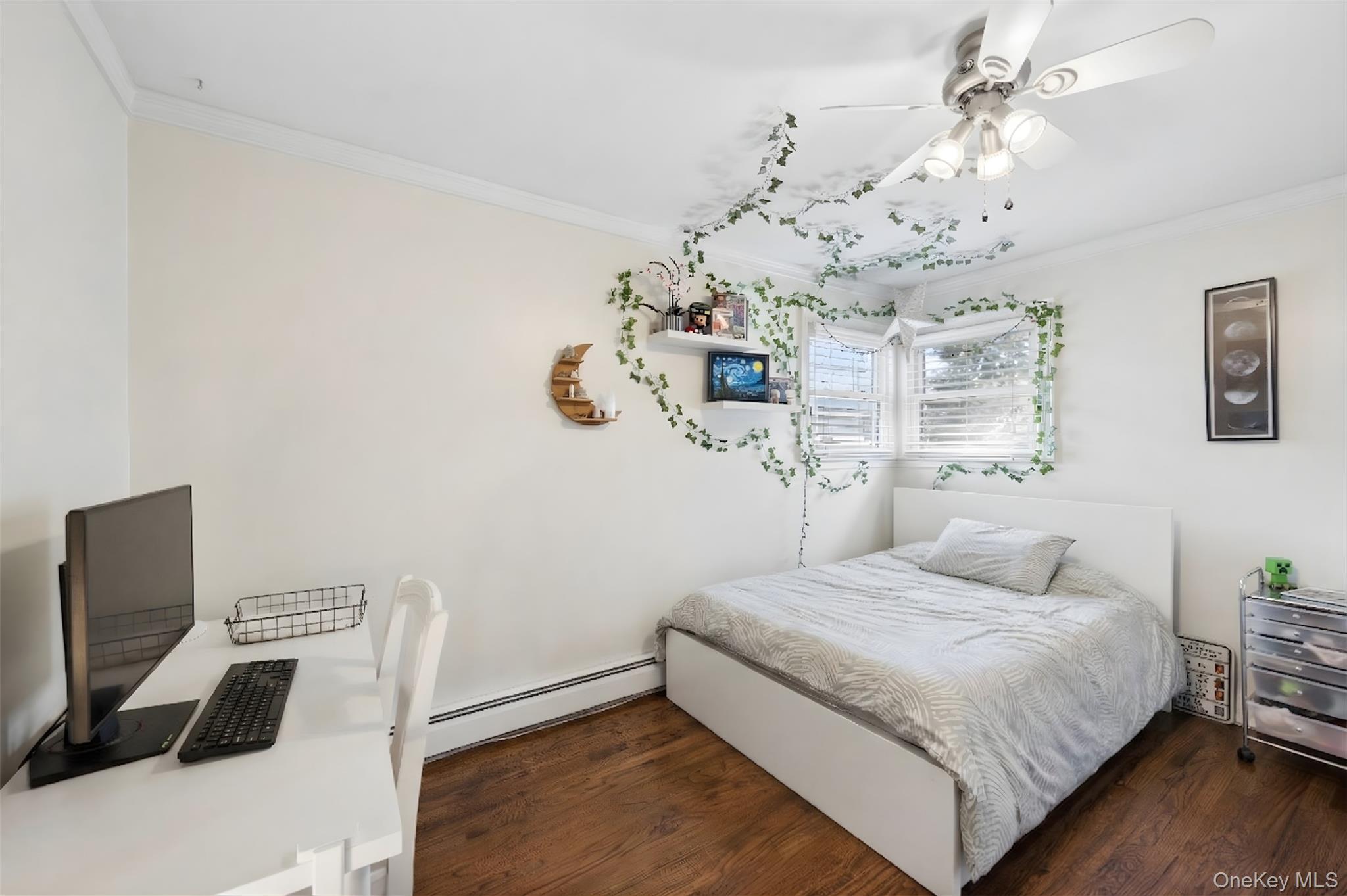 44 Archie Place West Islip, NY 11795 - Photo 20 of 36 a bedroom with a large bed and a window