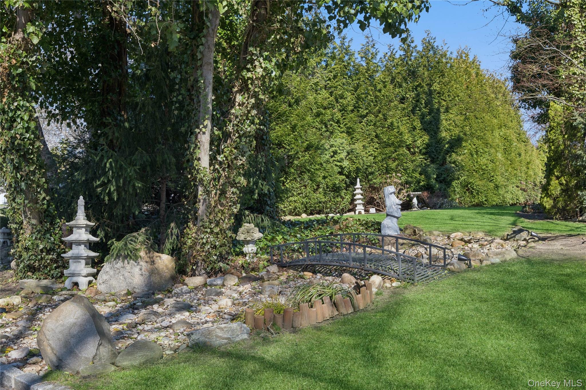 44 Archie Place West Islip, NY 11795 - Photo 24 of 36 a view of a park with large trees