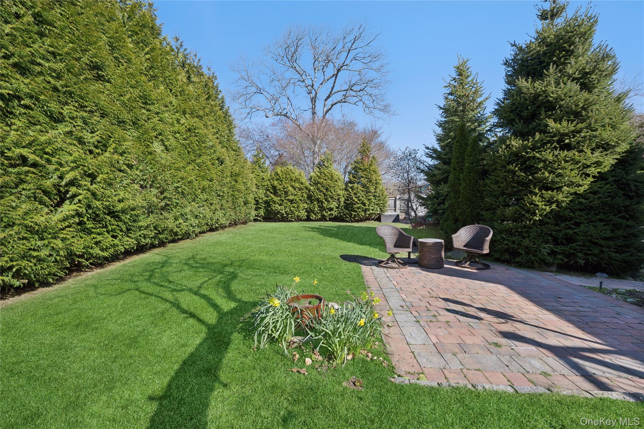 44 Archie Place West Islip, NY 11795 - Photo 29 of 36 a view of a chairs and backyard