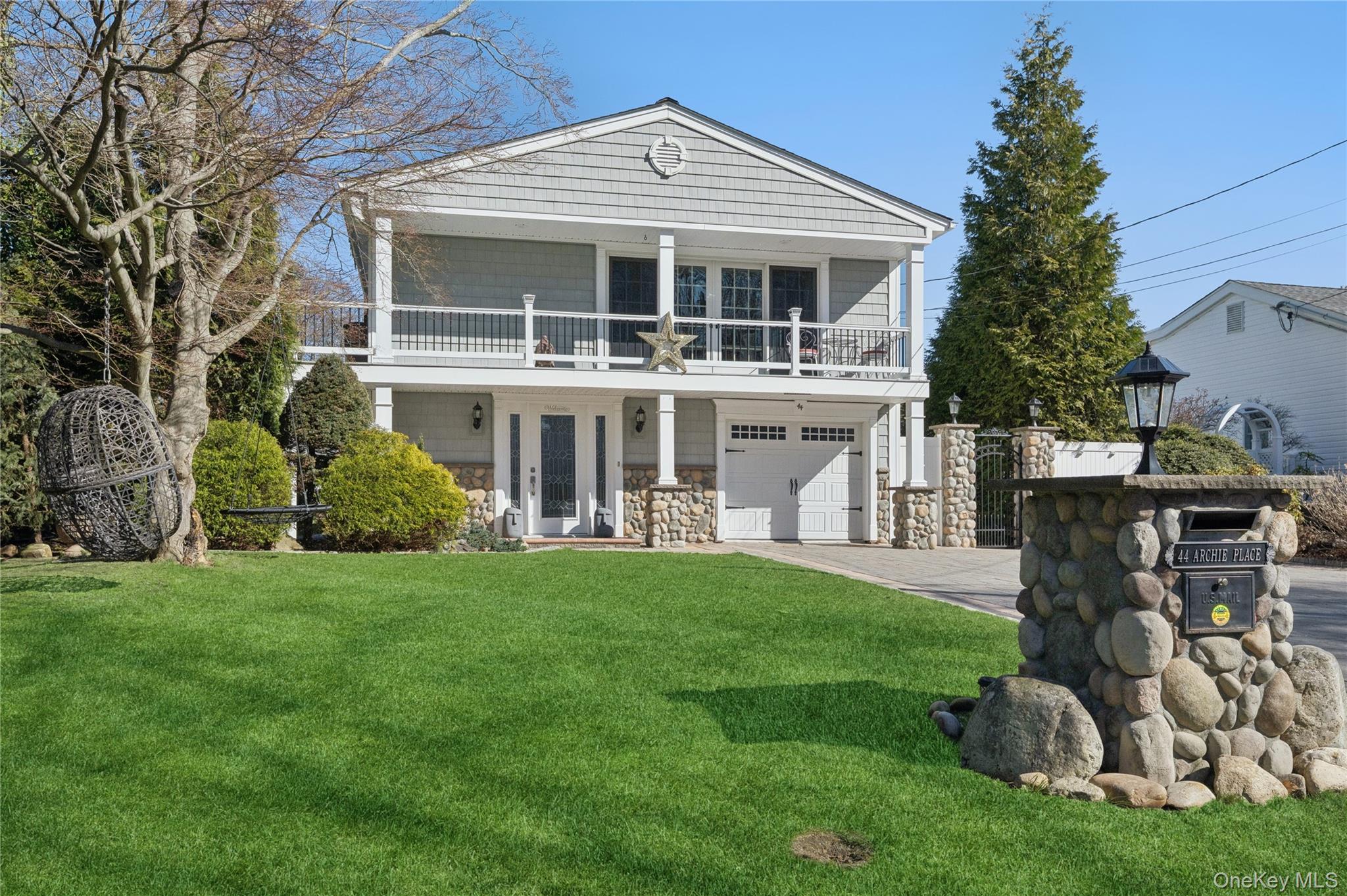 44 Archie Place West Islip, NY 11795 - Photo 3 of 36 a front view of a house with garden