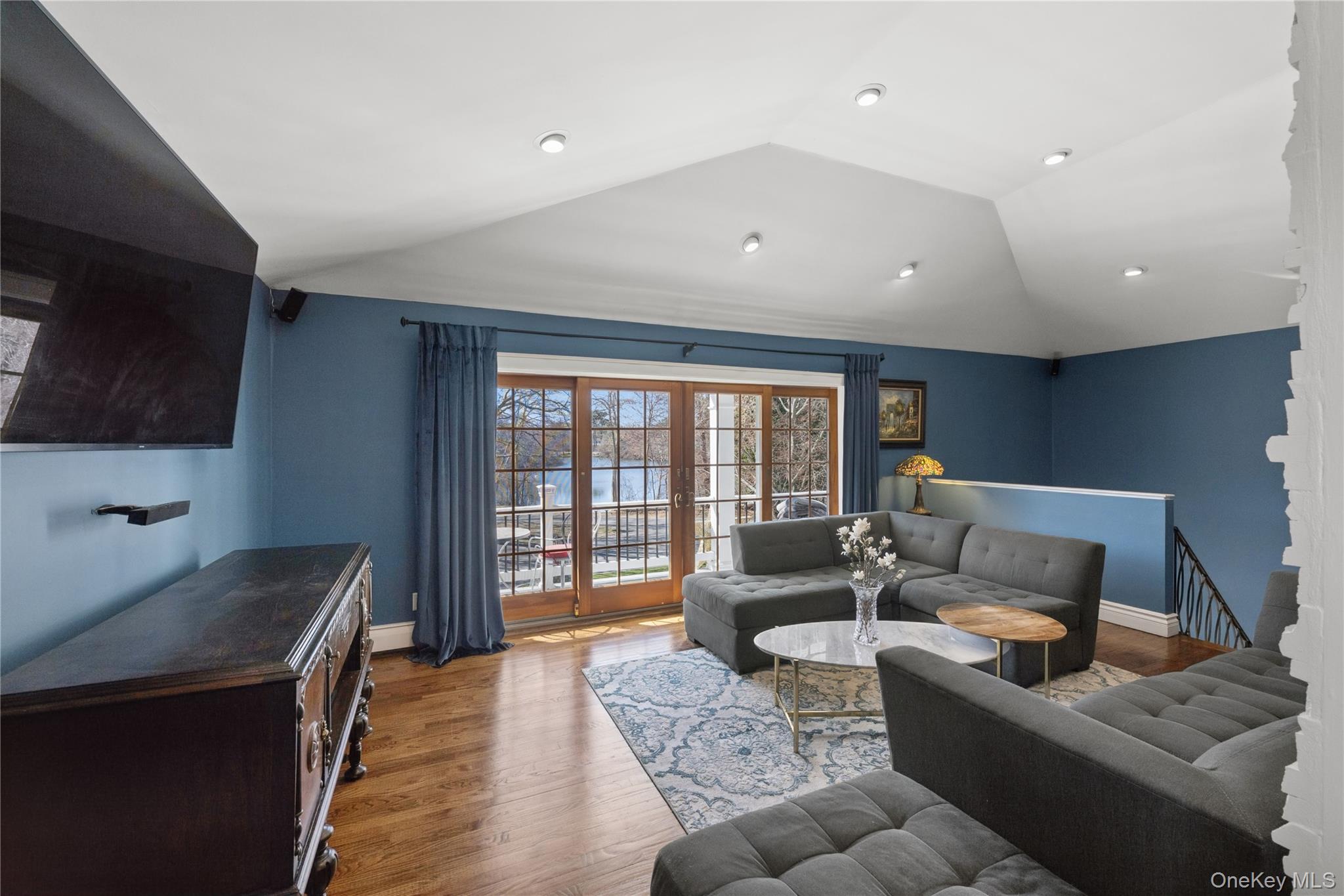 44 Archie Place West Islip, NY 11795 - Photo 8 of 36 a living room with furniture and a flat screen tv