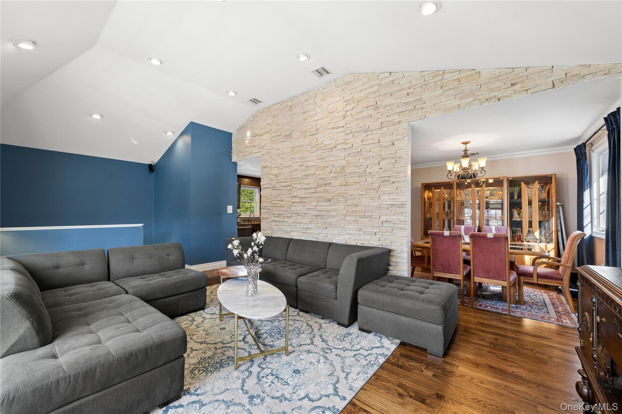 44 Archie Place West Islip, NY 11795 - Photo 9 of 36 a living room with furniture and wooden floor