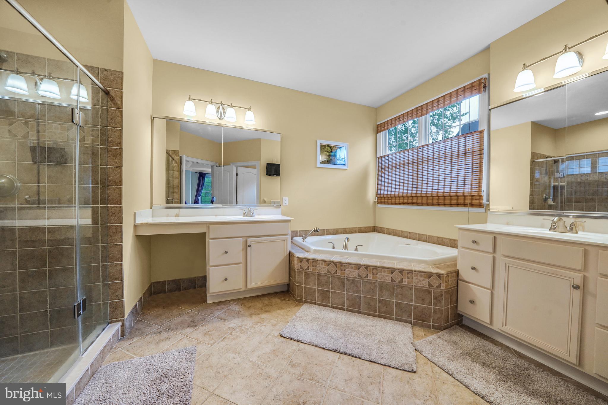 107 Sloan Road West Chester, PA 19382 - Photo 17 of 34 Master bath with two vanities and spa tub