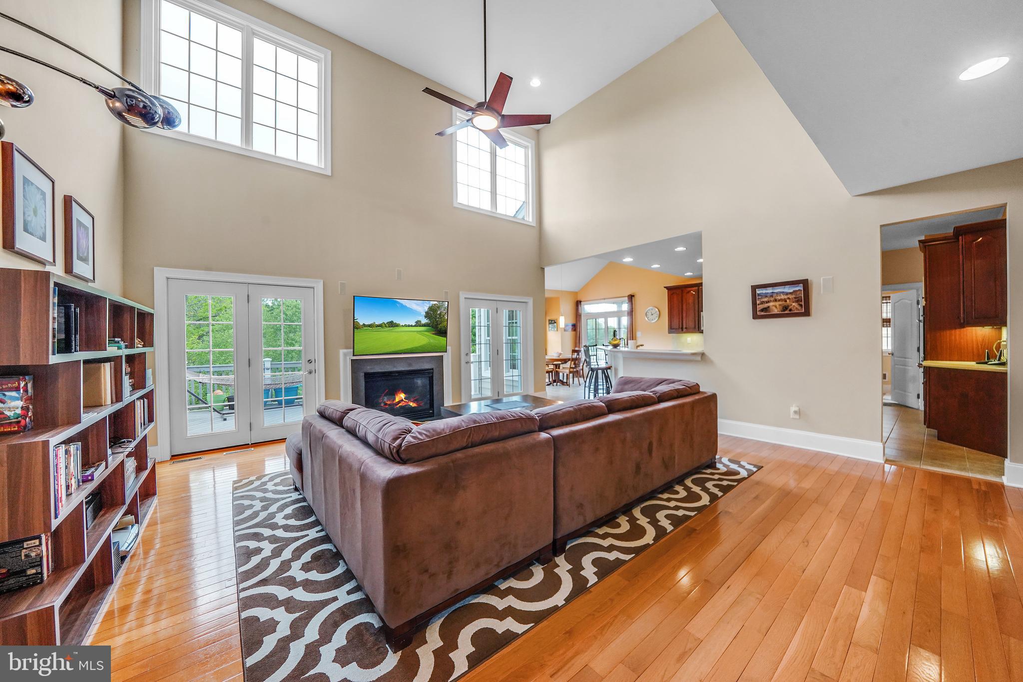 107 Sloan Road West Chester, PA 19382 - Photo 8 of 34 Great room with fireplace and sunlight abound