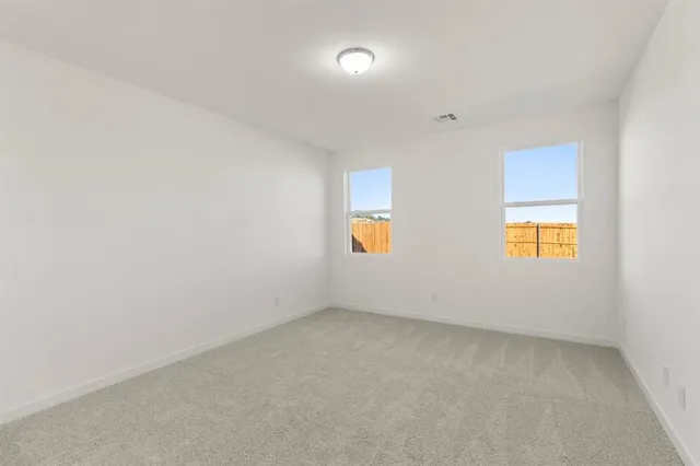 a bathroom with a sink double vanity and a mirror