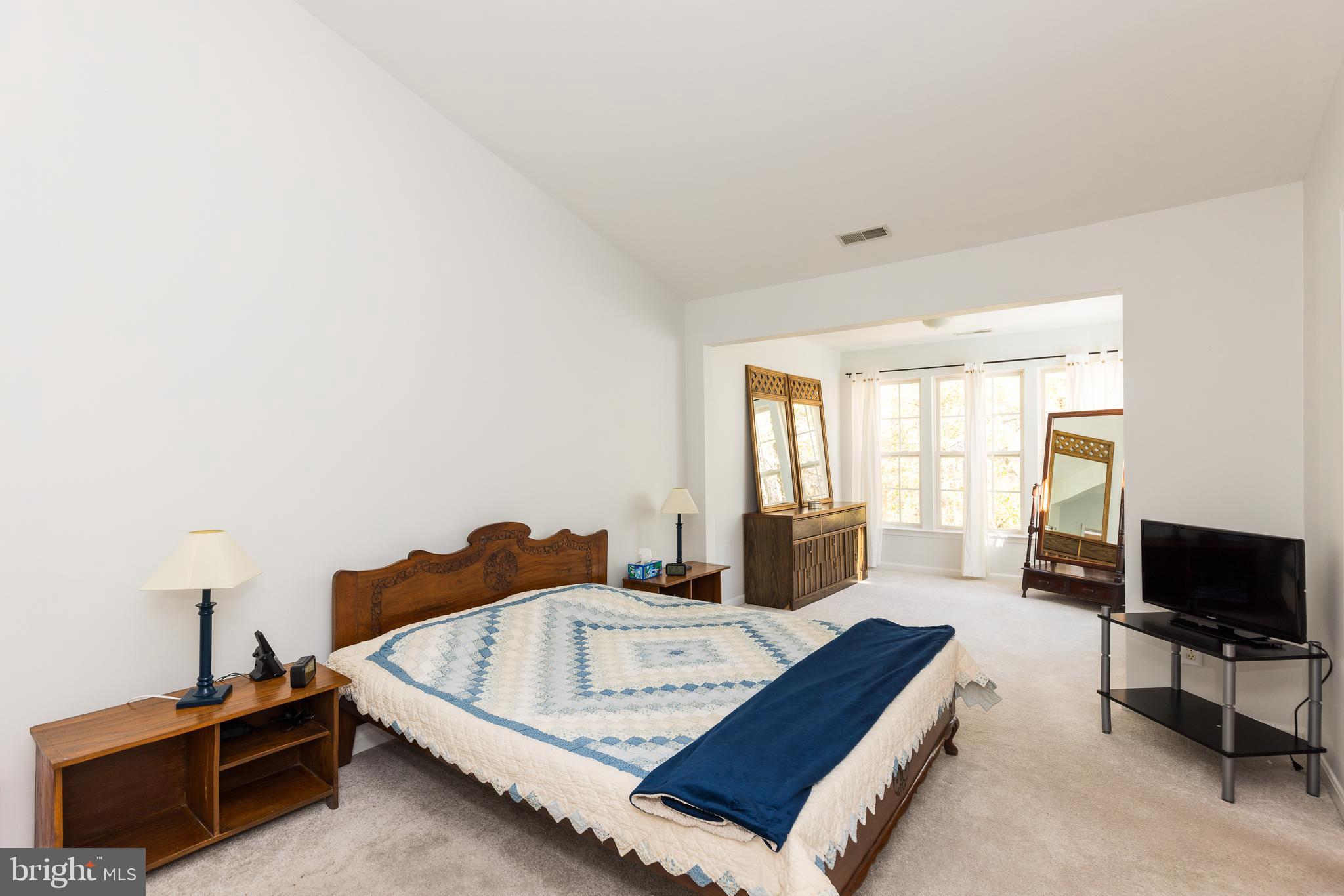 232 Night Haven Court Edgewater, MD 21037 - Photo 12 of 39 a living room with furniture and a flat screen tv