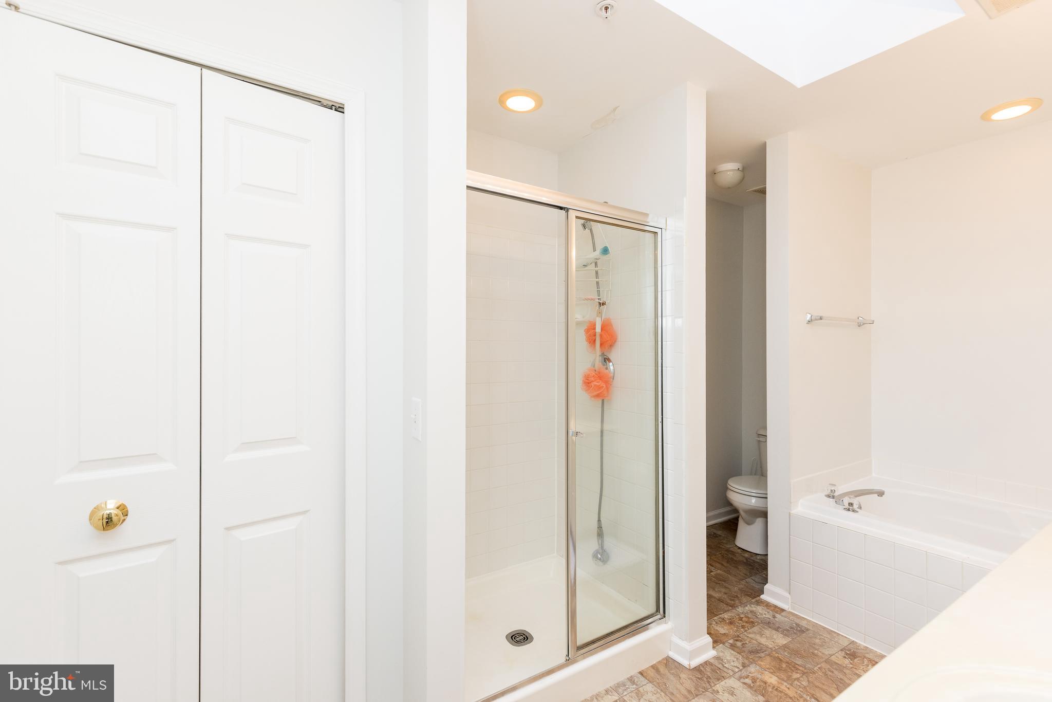 232 Night Haven Court Edgewater, MD 21037 - Photo 15 of 39 a bathroom with a shower and a tub