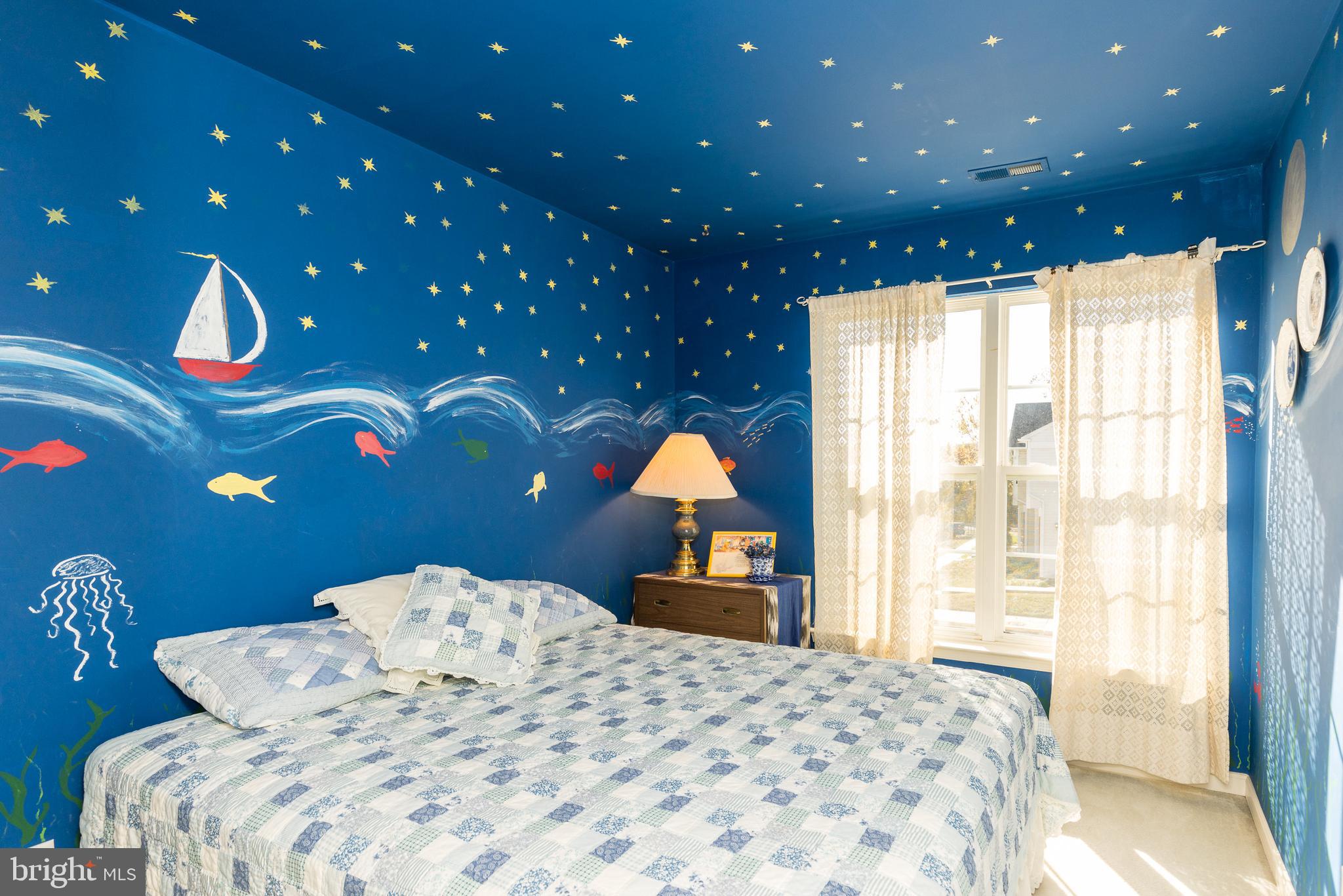 232 Night Haven Court Edgewater, MD 21037 - Photo 18 of 39 a bedroom with a bed and a lamp