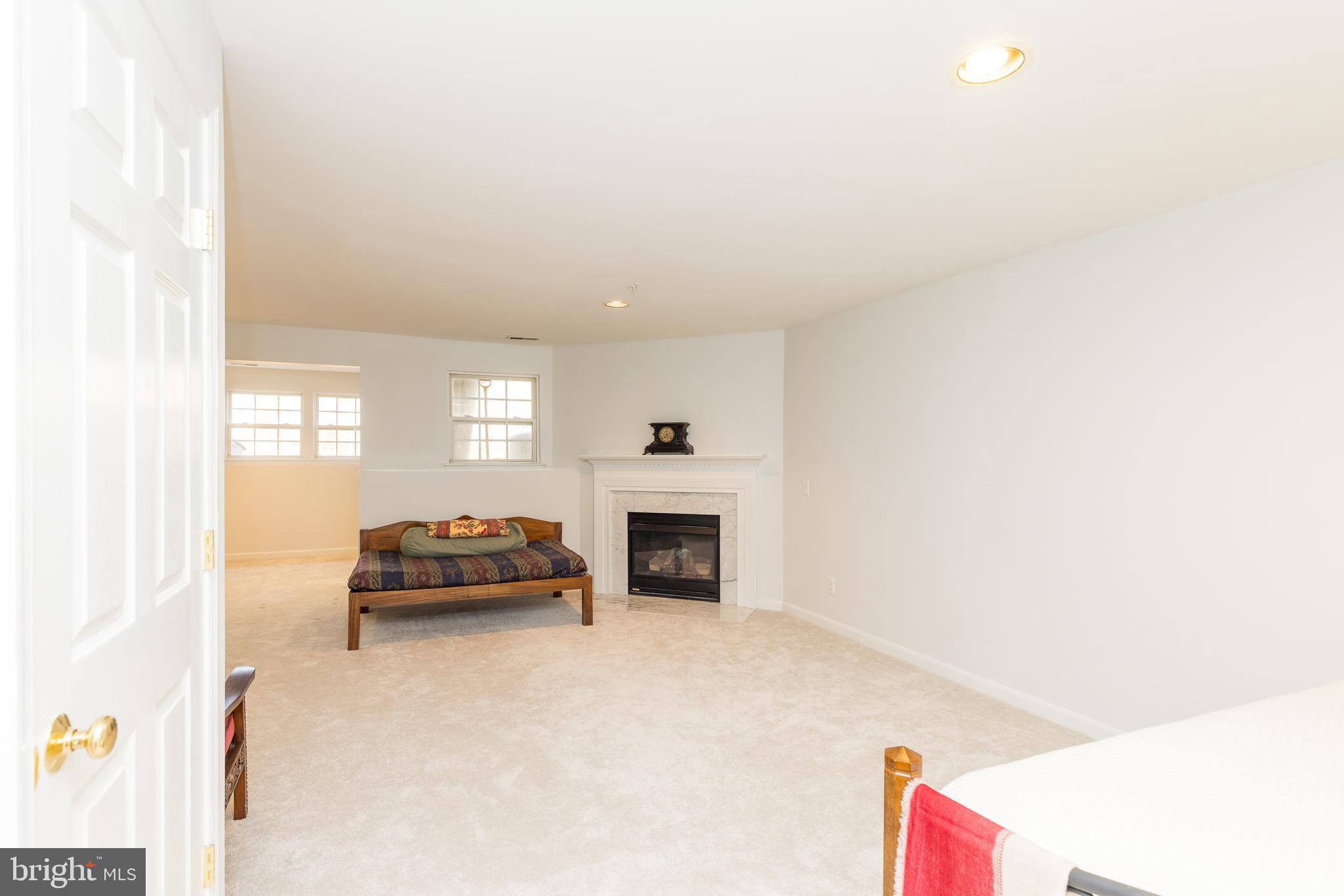 232 Night Haven Court Edgewater, MD 21037 - Photo 21 of 39 a living room with furniture and a fireplace
