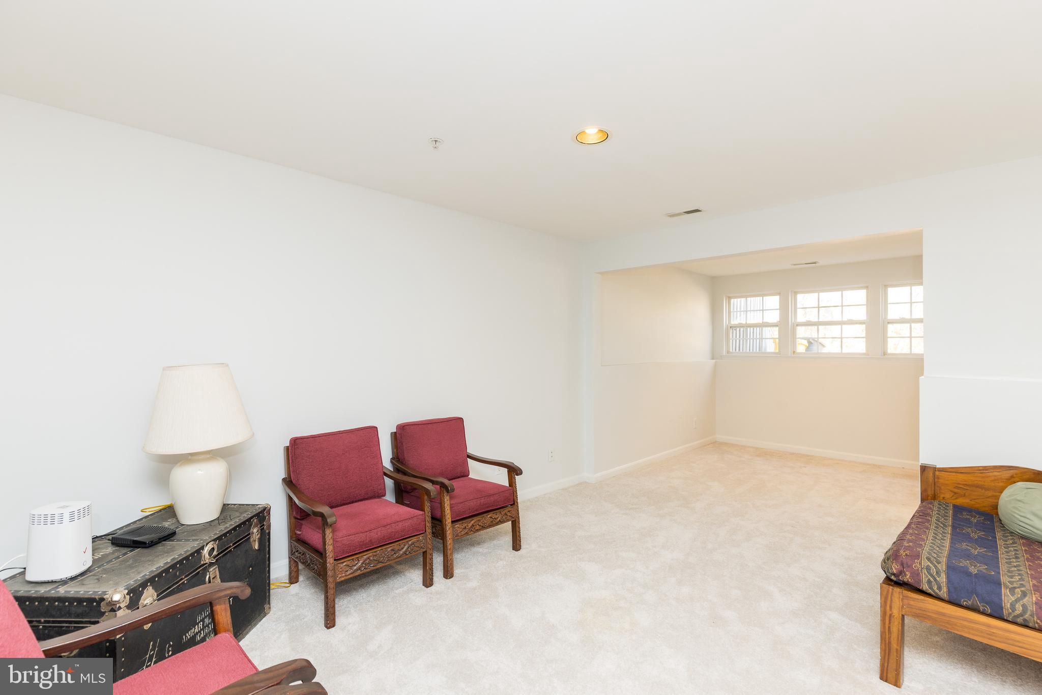 232 Night Haven Court Edgewater, MD 21037 - Photo 22 of 39 a living room with furniture and a window