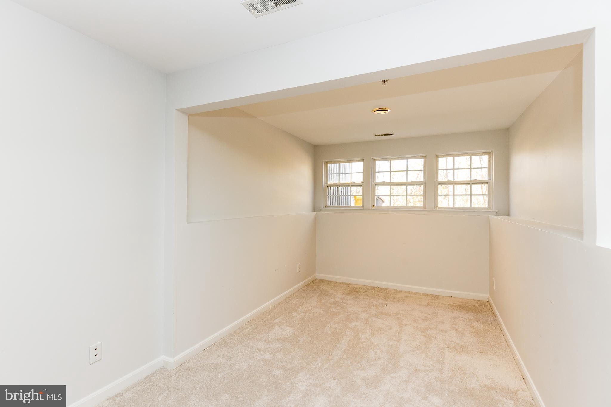 232 Night Haven Court Edgewater, MD 21037 - Photo 23 of 39 a view of an empty room with a window