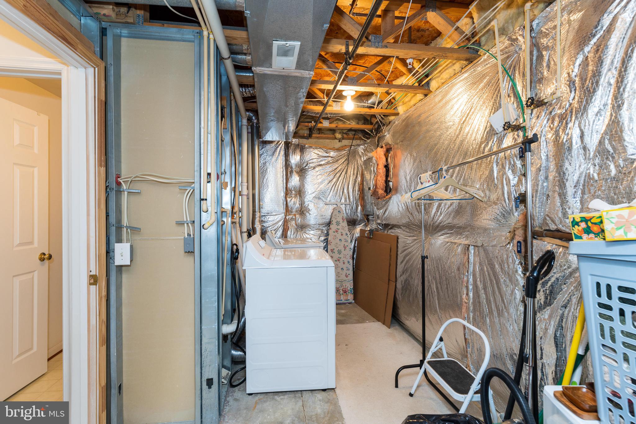 232 Night Haven Court Edgewater, MD 21037 - Photo 26 of 39 a view of walk in closet with clothes and shoes
