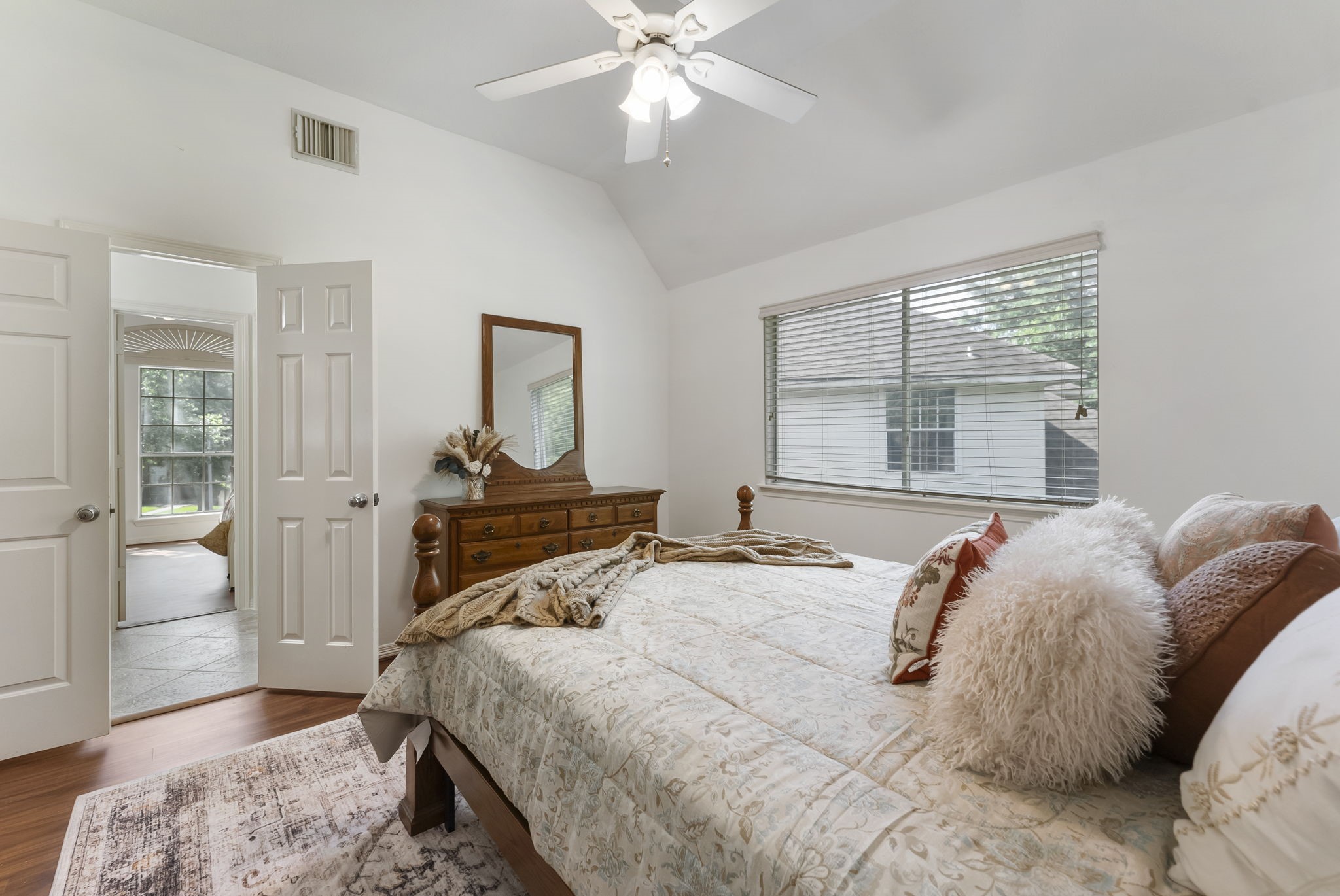 12907 Ryaneagles Circle Houston, TX 77044 - Photo 36 of 48 a bedroom with a bed and a window