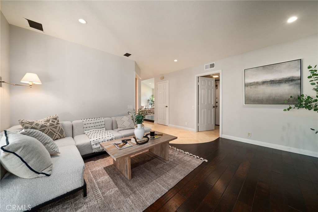 25695 La Cima Laguna Niguel, CA 92677 - Photo 16 of 52 a living room with furniture and wooden floor