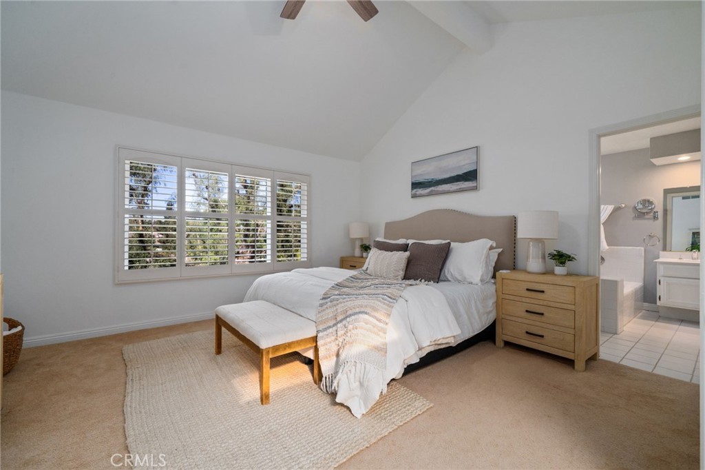 25695 La Cima Laguna Niguel, CA 92677 - Photo 19 of 52 a spacious bedroom with a bed and a window