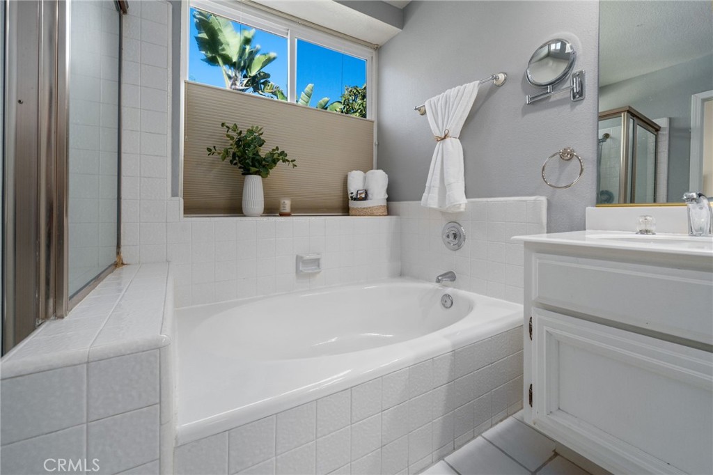 25695 La Cima Laguna Niguel, CA 92677 - Photo 22 of 52 a bathroom with a bathtub and sink