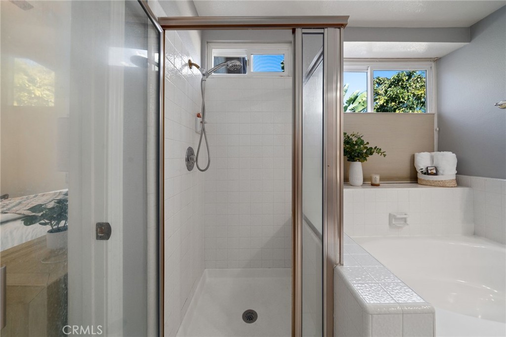 25695 La Cima Laguna Niguel, CA 92677 - Photo 25 of 52 a bathroom with a tub and shower