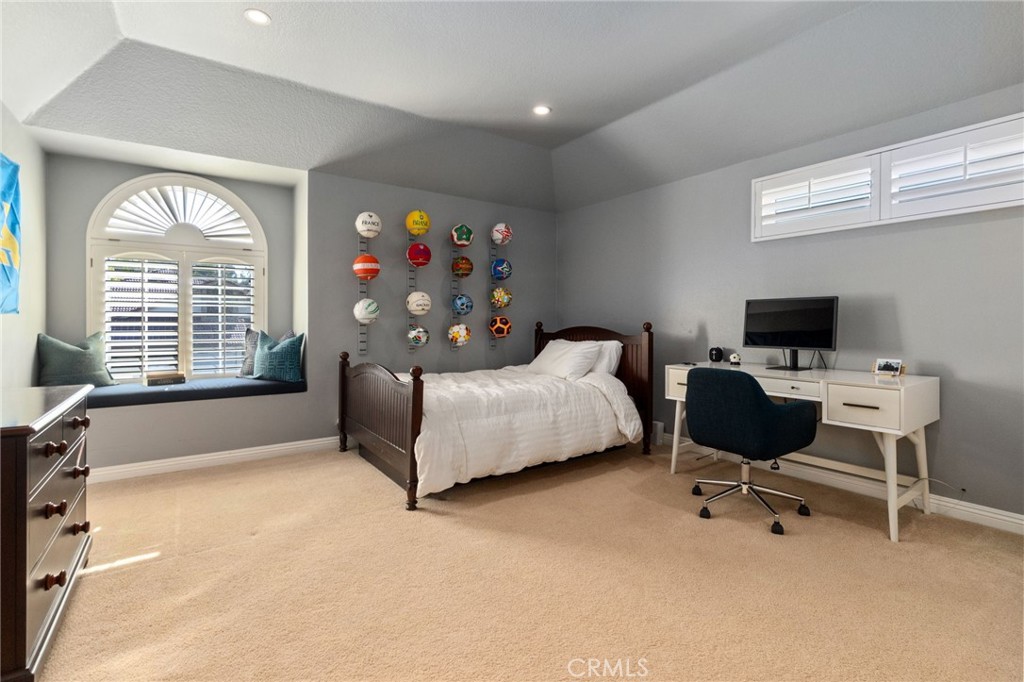 25695 La Cima Laguna Niguel, CA 92677 - Photo 26 of 52 a bedroom with a bed and a window