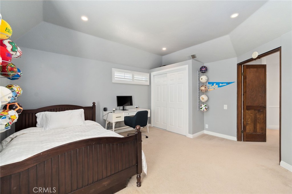 25695 La Cima Laguna Niguel, CA 92677 - Photo 27 of 52 a bedroom with a bed and a refrigerator