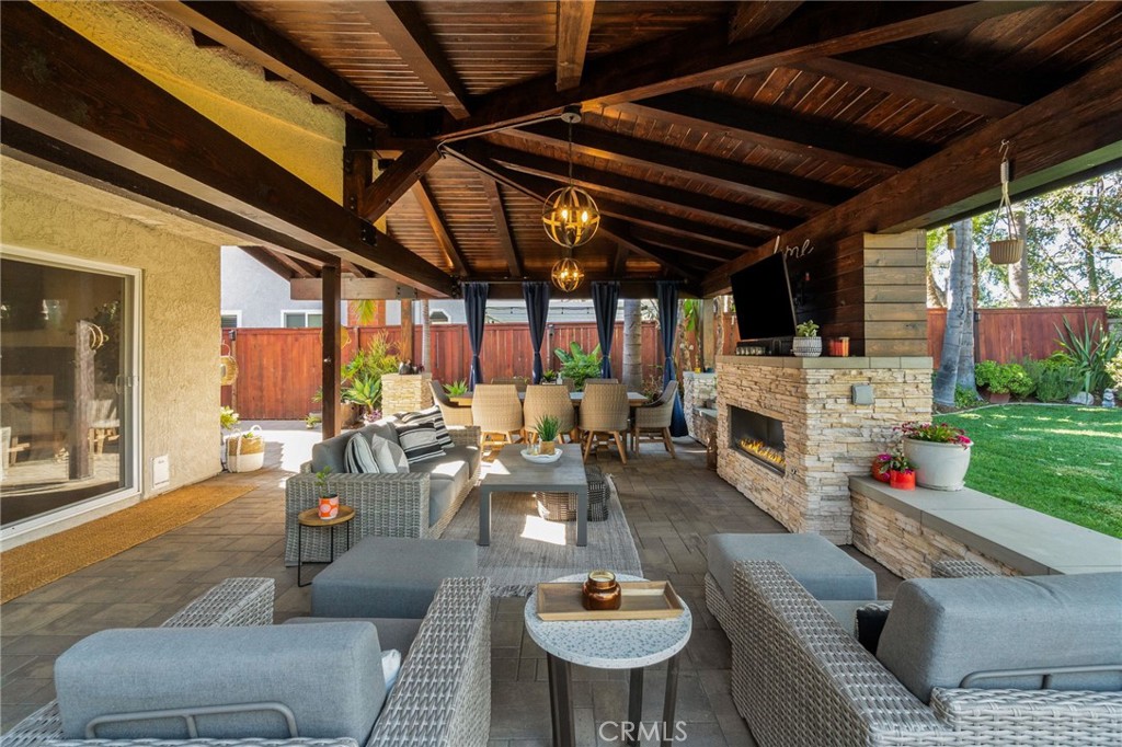 25695 La Cima Laguna Niguel, CA 92677 - Photo 34 of 52 a living room with furniture and a fireplace