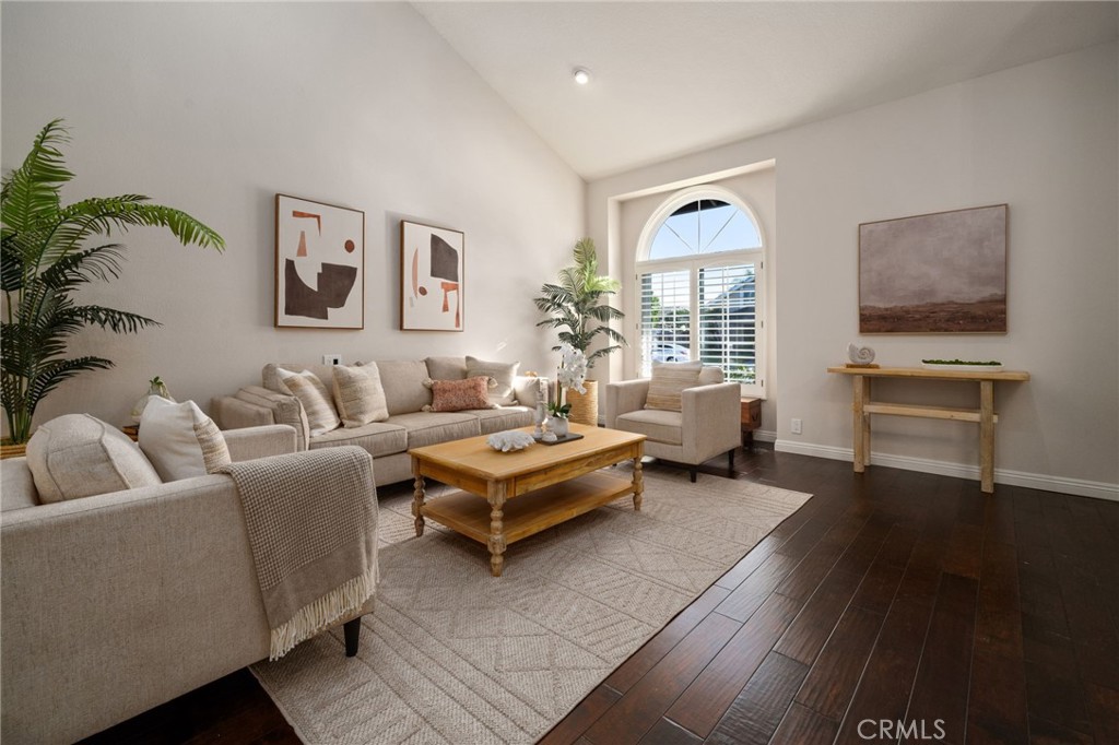 25695 La Cima Laguna Niguel, CA 92677 - Photo 4 of 52 a living room with furniture fireplace and wooden floor
