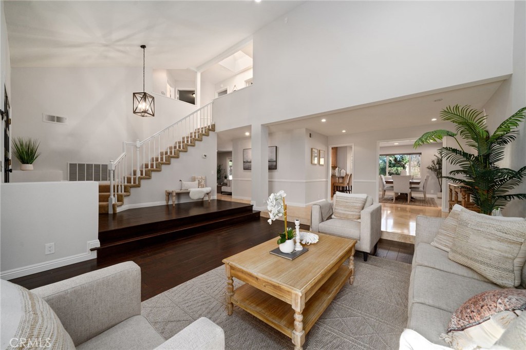 25695 La Cima Laguna Niguel, CA 92677 - Photo 5 of 52 a living room with furniture and wooden floor
