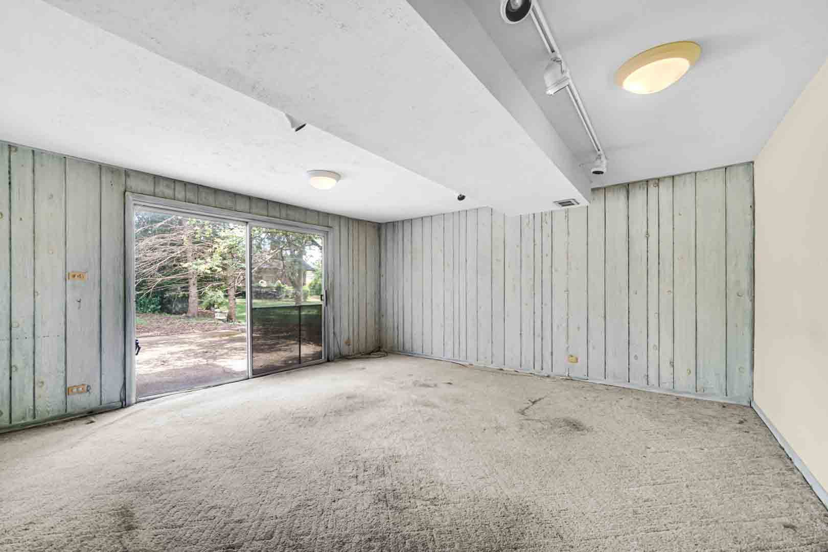 2826 Walnut Road Homewood, IL 60430 - Photo 15 of 20 a view of an empty room with a sliding door