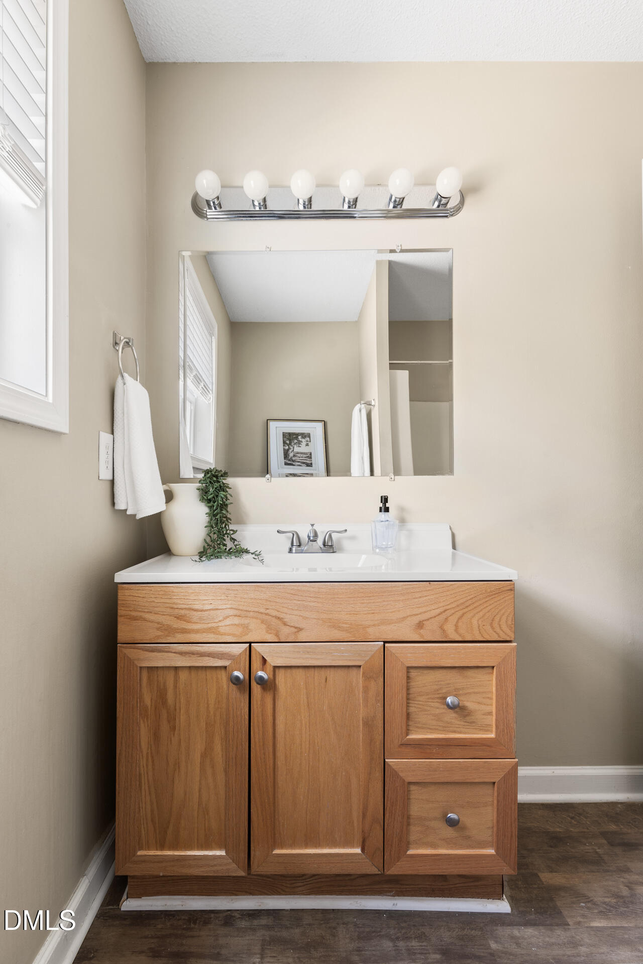 1004 Cheviot Avenue Durham, NC 27707 - Photo 21 of 34 a bathroom with a sink vanity and mirror