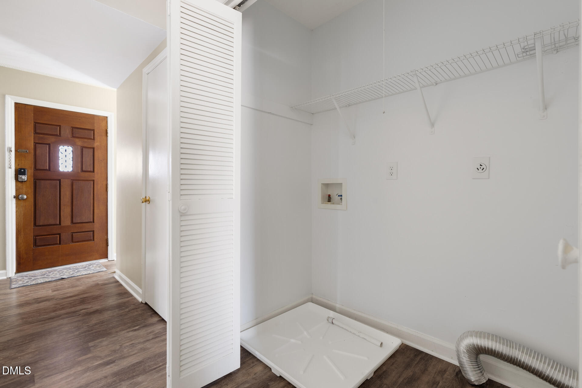 1004 Cheviot Avenue Durham, NC 27707 - Photo 23 of 34 a view of a room with wooden floor and closet