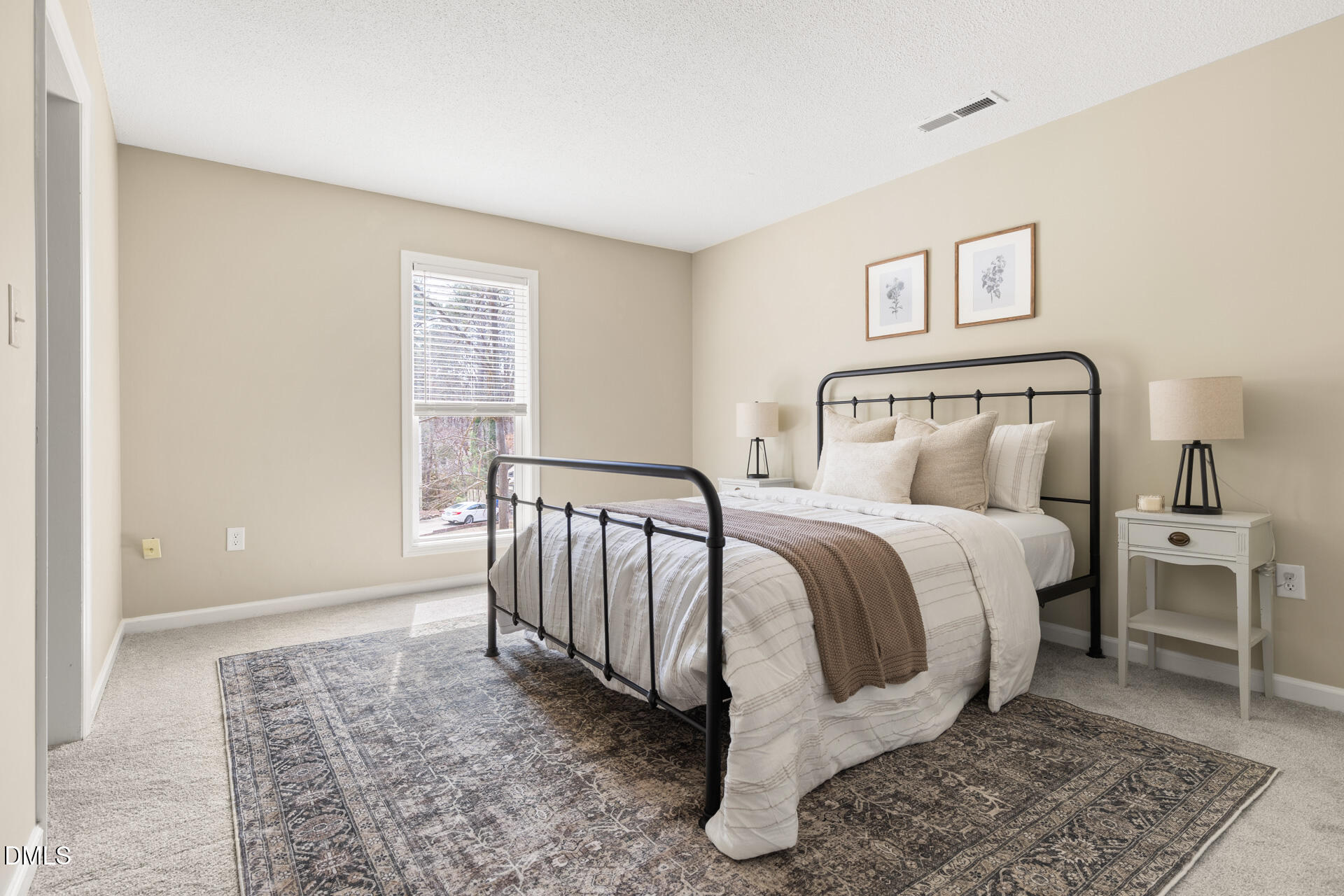 1004 Cheviot Avenue Durham, NC 27707 - Photo 24 of 34 a bed room with a bed and a night stand