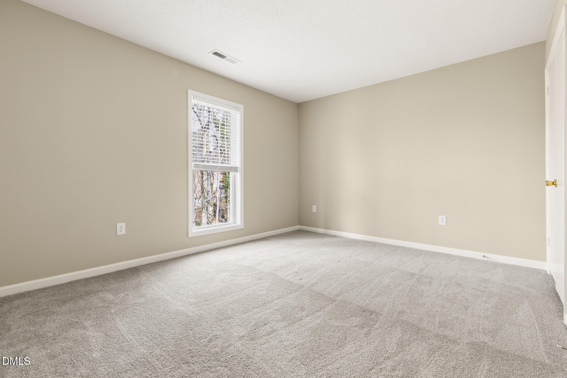 1004 Cheviot Avenue Durham, NC 27707 - Photo 30 of 34 a view of an empty room with a window