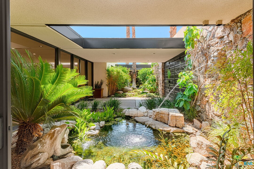 70170 Sonora Road Rancho Mirage, CA 92270 - Photo 6 of 45 a garden view with a seating space