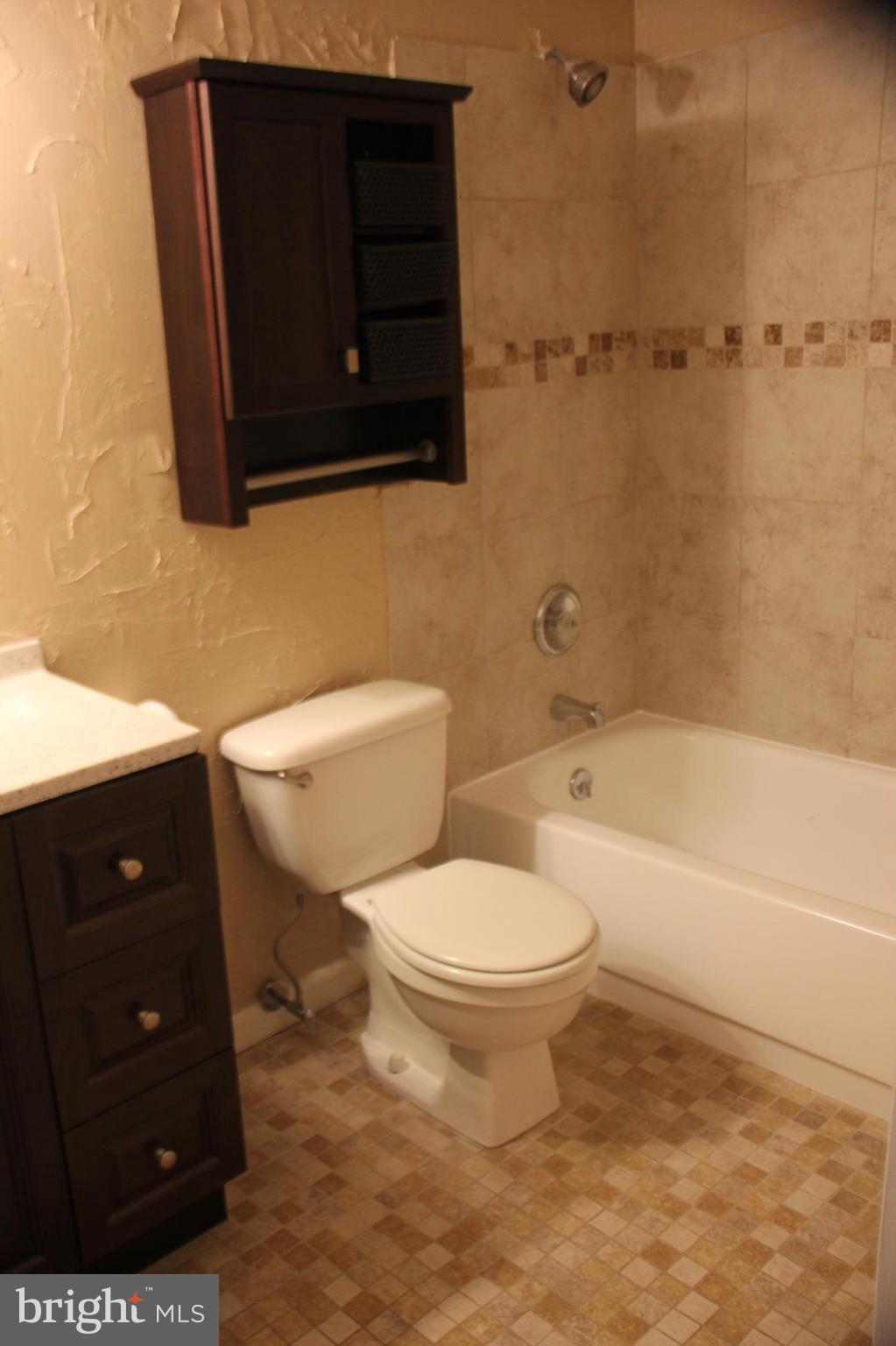 11240 Chestnut Grove Square, Unit 360 Reston, VA 20190 - Photo 14 of 29 Updated bathroom