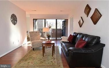 11240 Chestnut Grove Square, Unit 360 Reston, VA 20190 - Photo 6 of 29 Living Room with Furniture