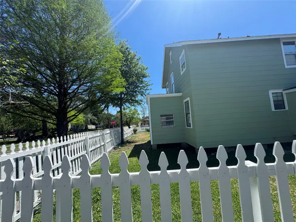 a view of a wooden fence
