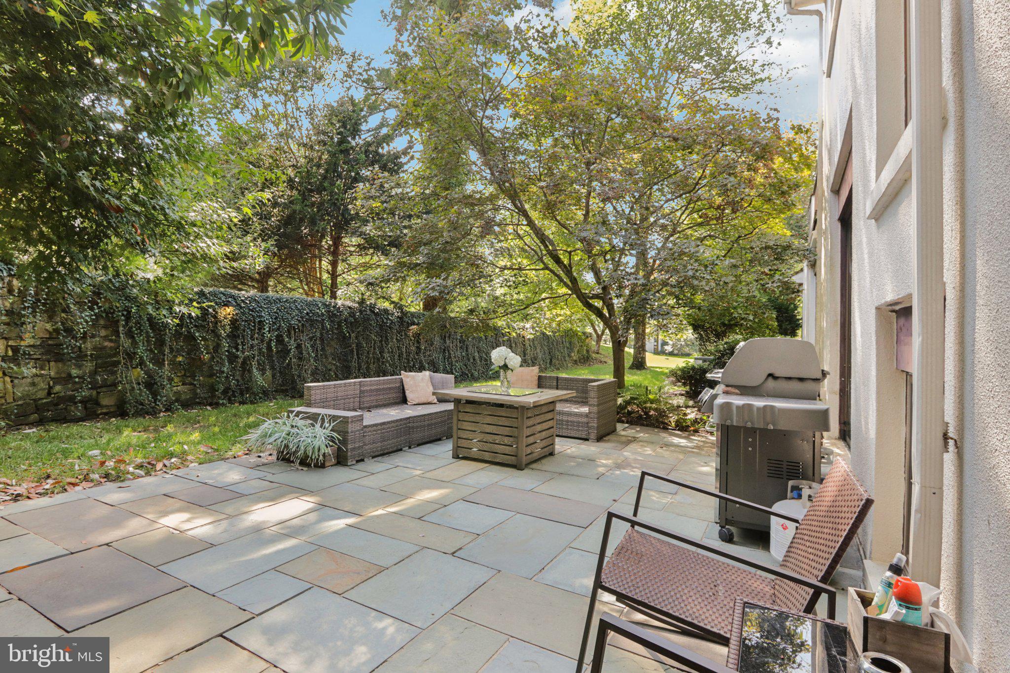 6 Avignon Devon, PA 19333 - Photo 21 of 57 a view of backyard with seating space and trees