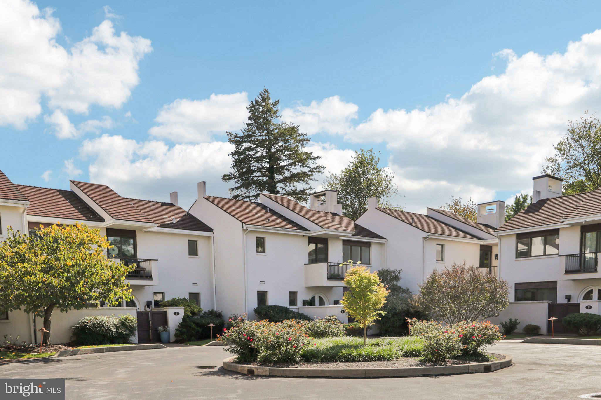 6 Avignon Devon, PA 19333 - Photo 24 of 61 a front view of a house with a yard and outdoor seating