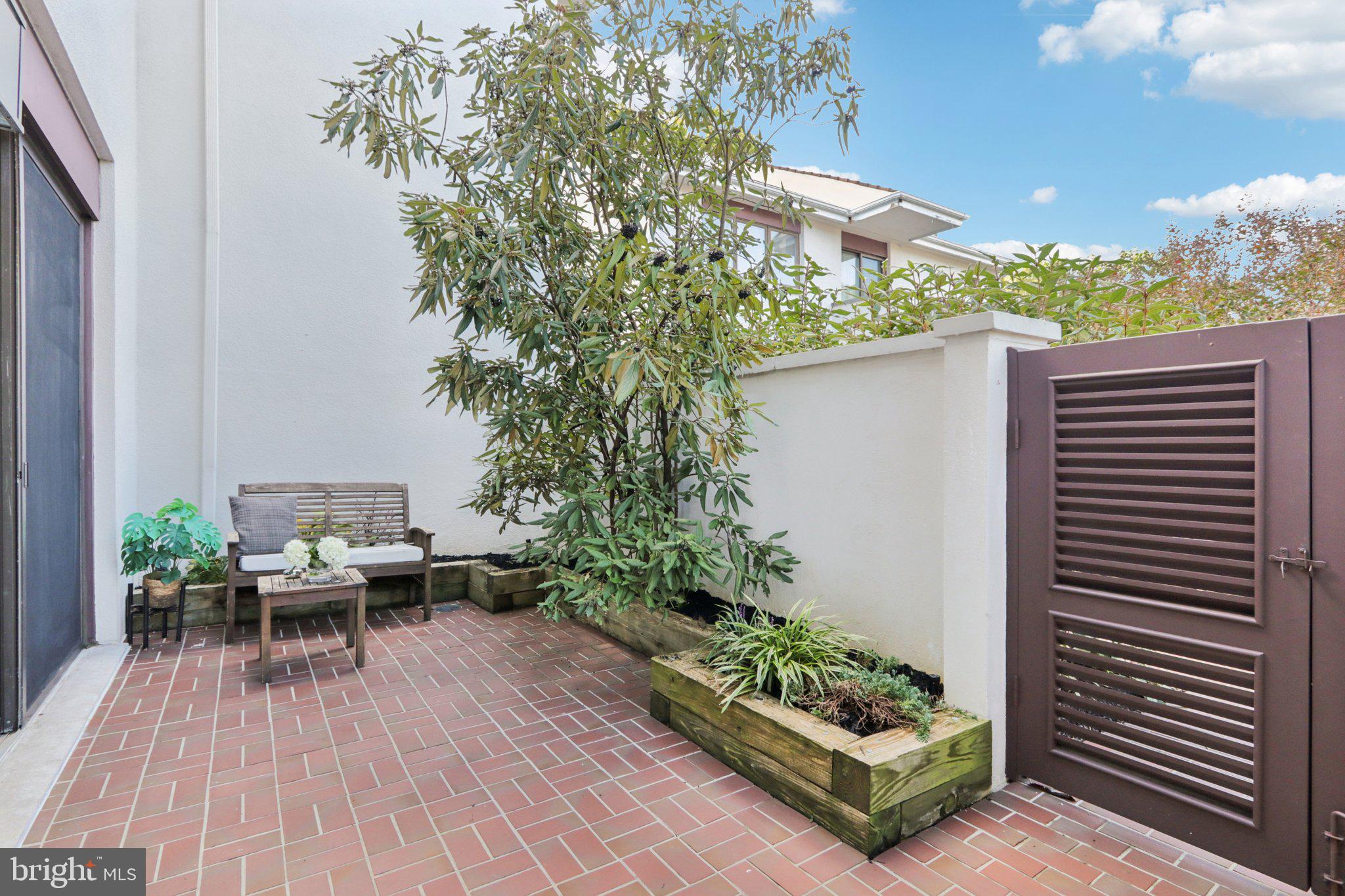 6 Avignon Devon, PA 19333 - Photo 3 of 61 a view of a backyard with sitting area